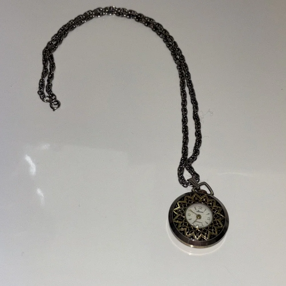 Vintage Alaron Pendant Watch Necklace Silver Tone Filigree Floral Sunburst Dial